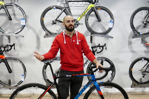 Road bikes on shop wall